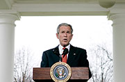 U.S. President Bush makes a statement about the economy at the White House in Washington 